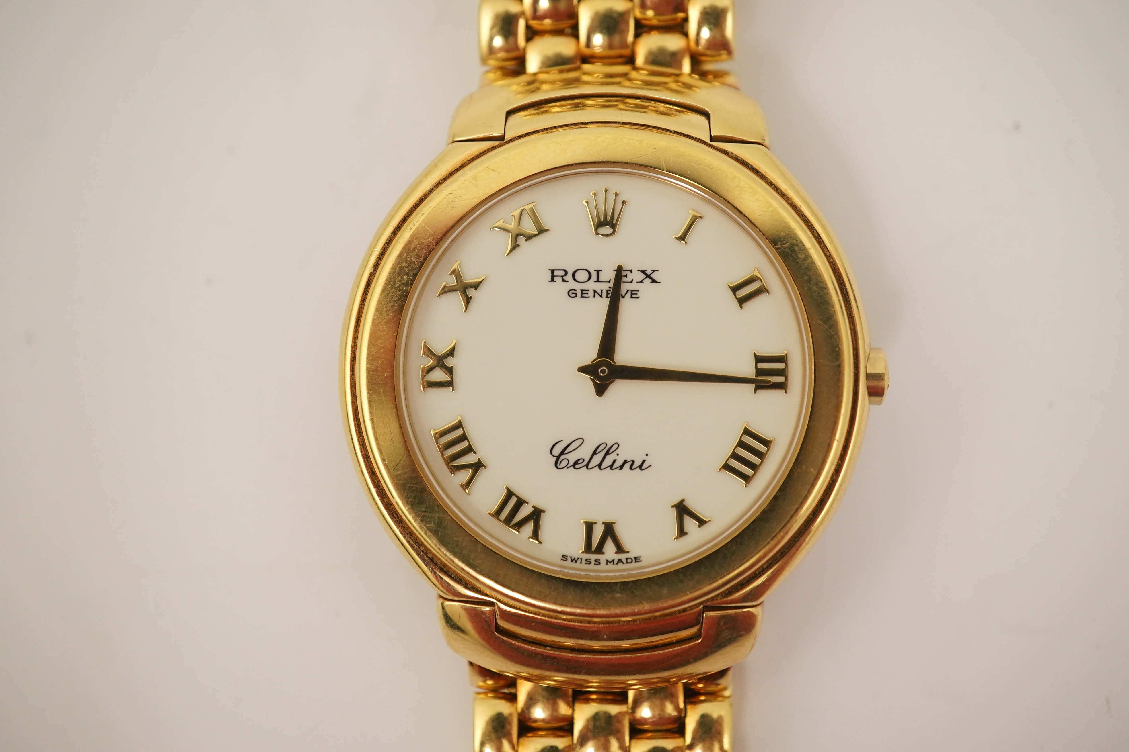 A gentleman's 1990's 18ct gold Rolex Cellini quartz dress wrist watch, on an 18ct gold Rolex brick link bracelet, with deployment clasp